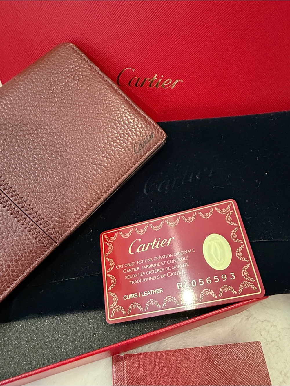 Cartier Pebbled Burgundy Leather wallet with Red Authentication Card / Box EUC